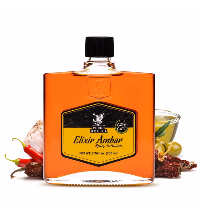 FUEGO MEXIKA® | Elixir Ambar - spicy Virgin Olive Oil Infusion with a Blend of Chipotle, Rojo de Arbol, Morita Chili Peppers and natural Garlic - crafted from Whole Ingredients only.